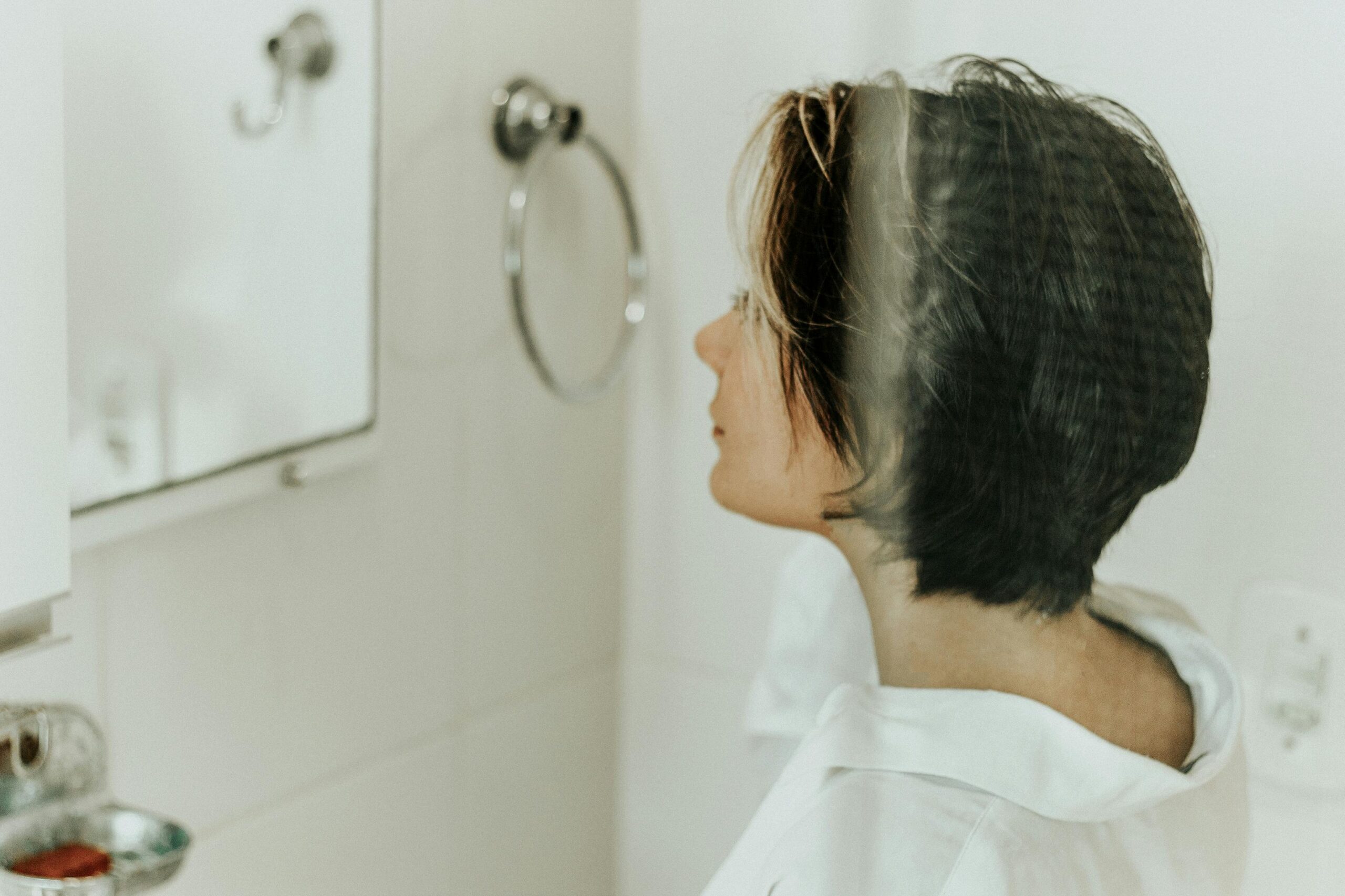 woman hair falling out